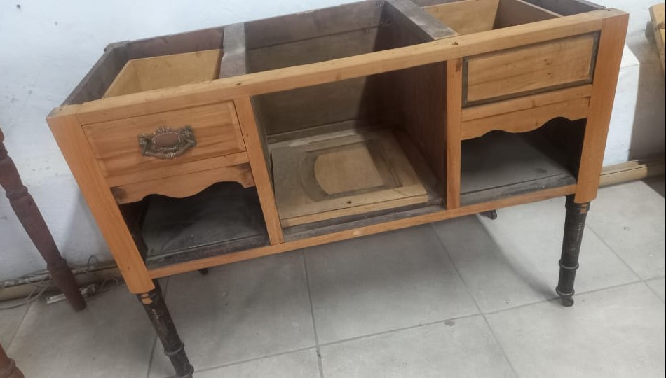 Base cabinet stripped to natural wood