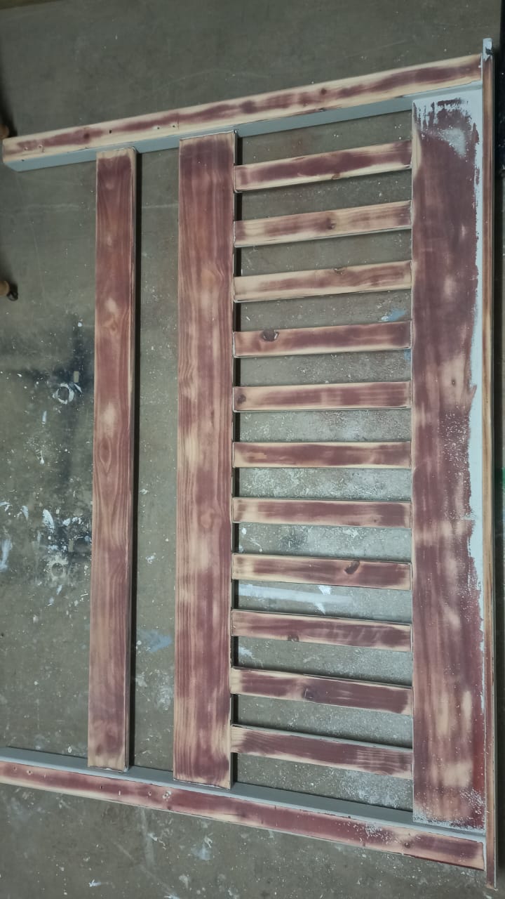 Workshop process showing headboard refinishing